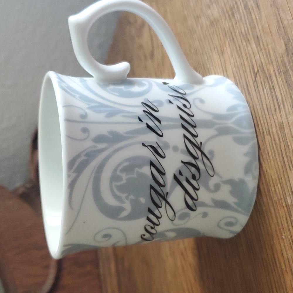 R table Cougar In Disguise Ceramic Coffee Mug